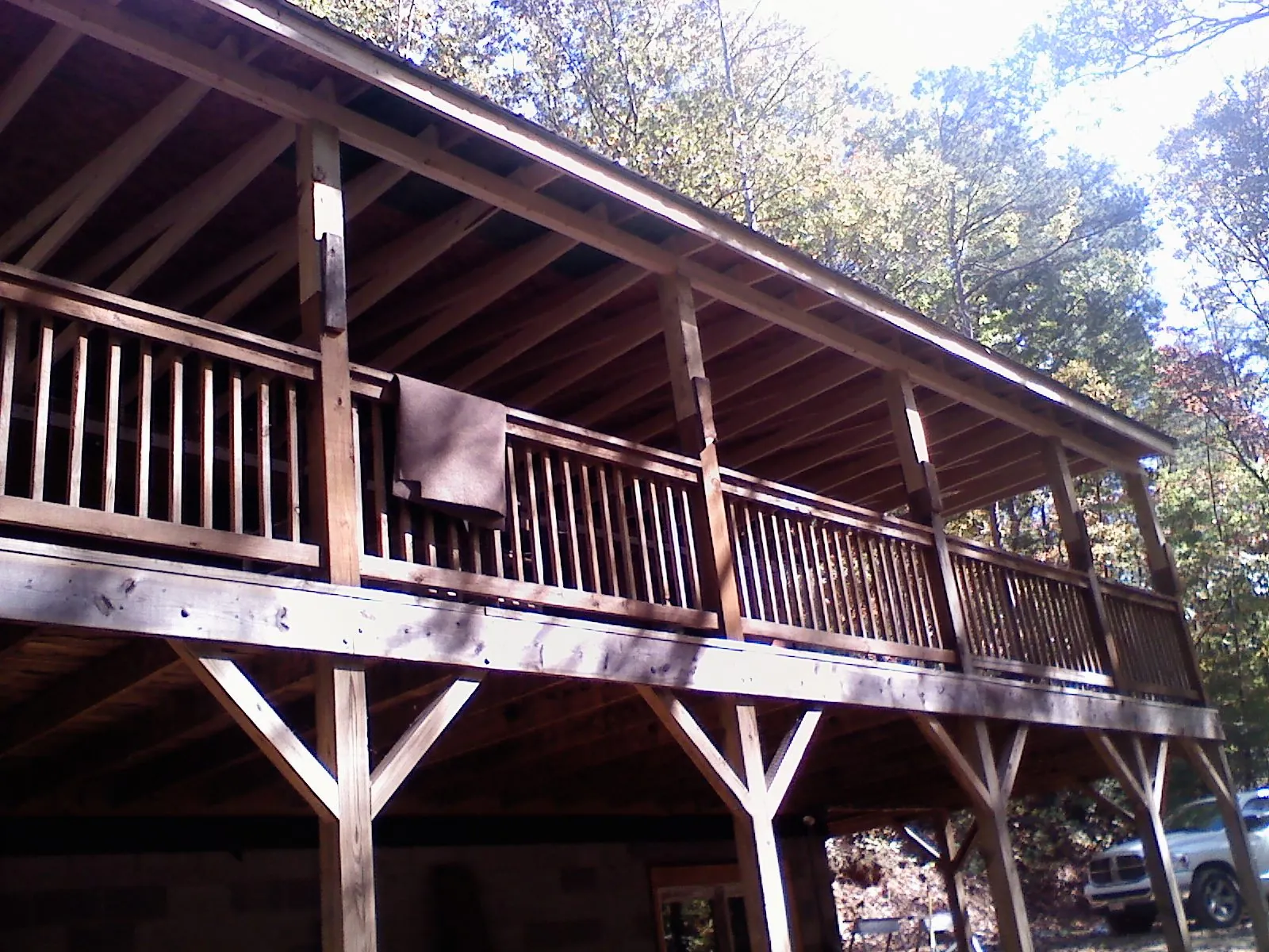 Timber framing under a new elevated porch and deck — Roof Leak Repair in Stone Creek by Roofing Brothers